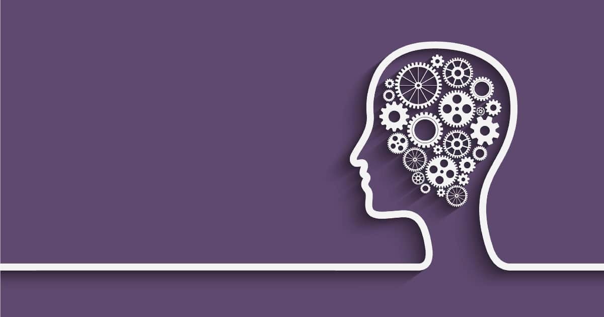 human-head-silhouette-with-gears-on-purple-background-wide